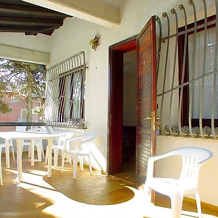 Отель Wide Row House With Private Fenced Garden For 9 Guests In Lignano Pineta 4*