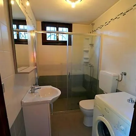 Отель Wide Row House With Private Fenced Garden For 9 Guests In Lignano Pineta